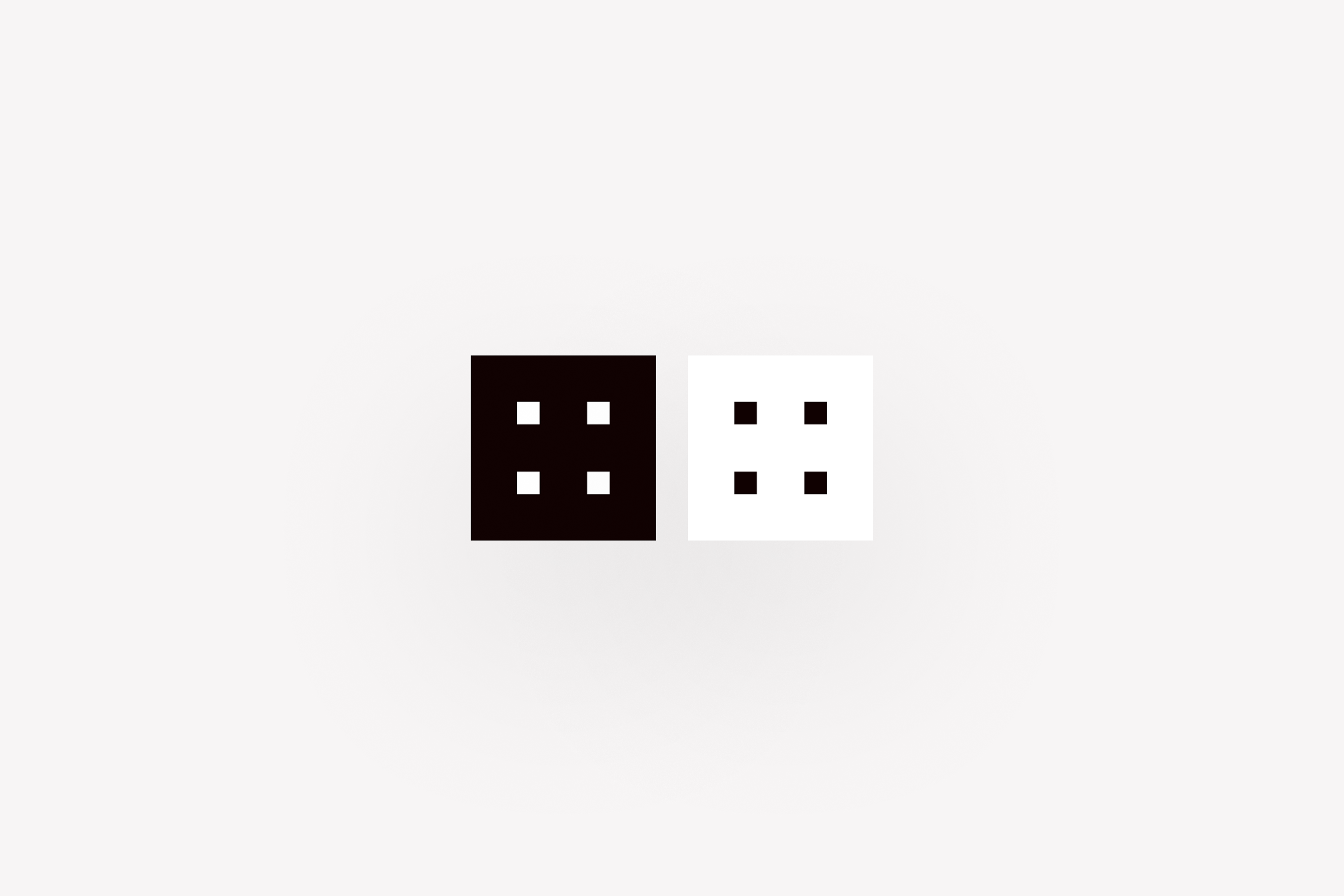 Two favicons, one in black and one in white. The image shows four small squares forming the outline of a large square.